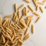 Bona Furtuna Penne - Organic, Low-Gluten Penne Pasta on Countertop