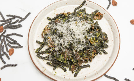 Nero di Seppia Busiate with Kale Pesto and Sauteed Porcini Mushrooms
