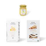 Bona Furtuna products including a organic honey jar, Taralli, and Biscotti on a white background - Buone Feste authentic italian food gift baskets