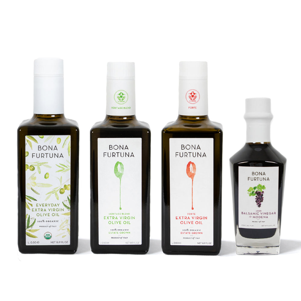 Four bottles of Bona Furtuna olive oil and vinegar on a white background - Heritage Blend Award-winning extra virgin sicilian olive oil- holiday gift set - italian food gift basket