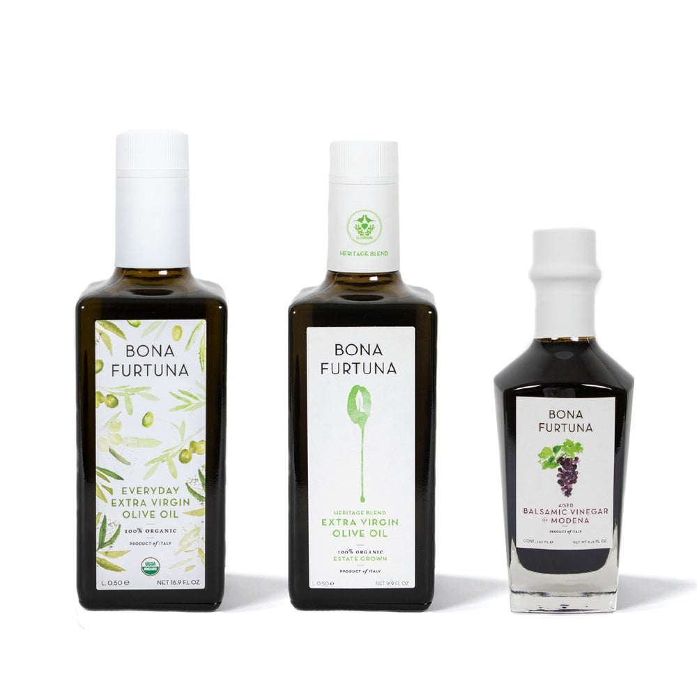 Three bottles of Bona Furtuna olive oil and vinegar on a white background - Heritage Blend Award-winning extra virgin sicilian olive oil- holiday gift set - italian food gift baskets