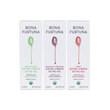 Three Bona Furtuna olive oil boxes on a white background, labeled Heritage Blend, Biancolilla Centinara, and Forte, with green, purple, and red graphic accents.