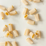 Bona Furtuna paccheri pasta on marble counter