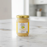 Bona Furtuna organic raw Lemon Blossom Honey on a kitchen counter